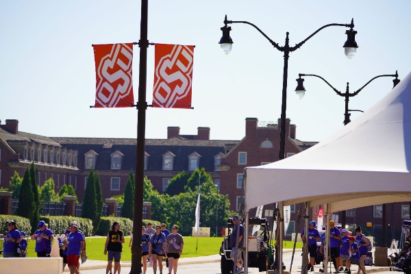 Photo of Special Olympics olympic village with Bennett Hall in the background.